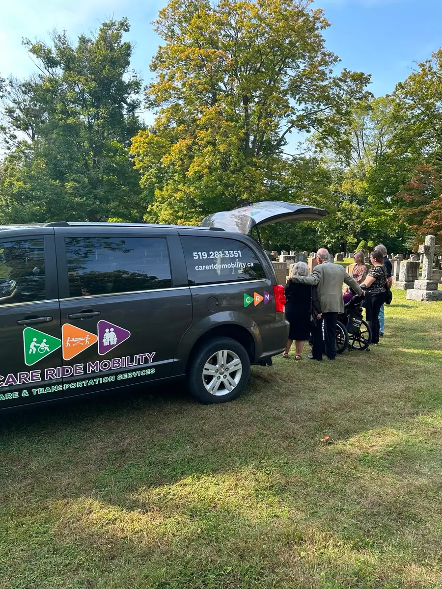 Care Ride Mobility van with wheelchair ramp deployed outside a building